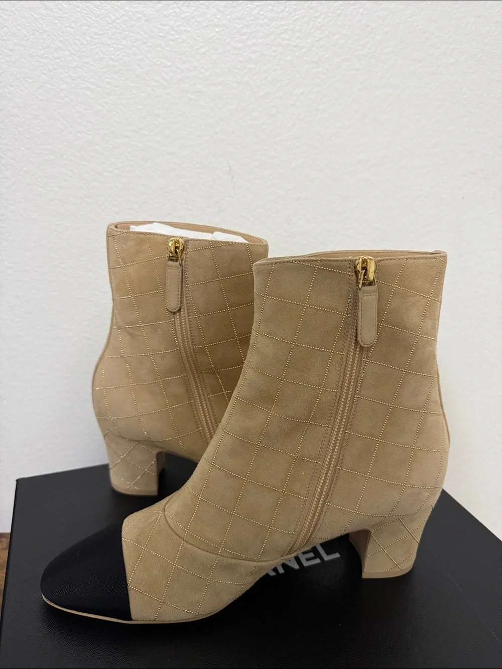CHANEL Beige Quilted Ankle Boots with Black Cap Toe
